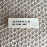 "My mother made me wear this!" label